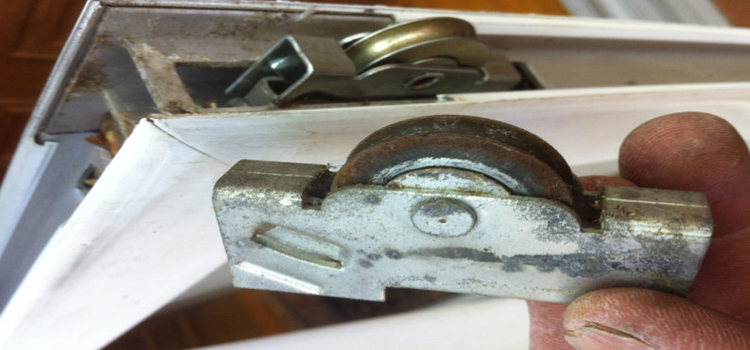 screen door roller repair in The Crossings
